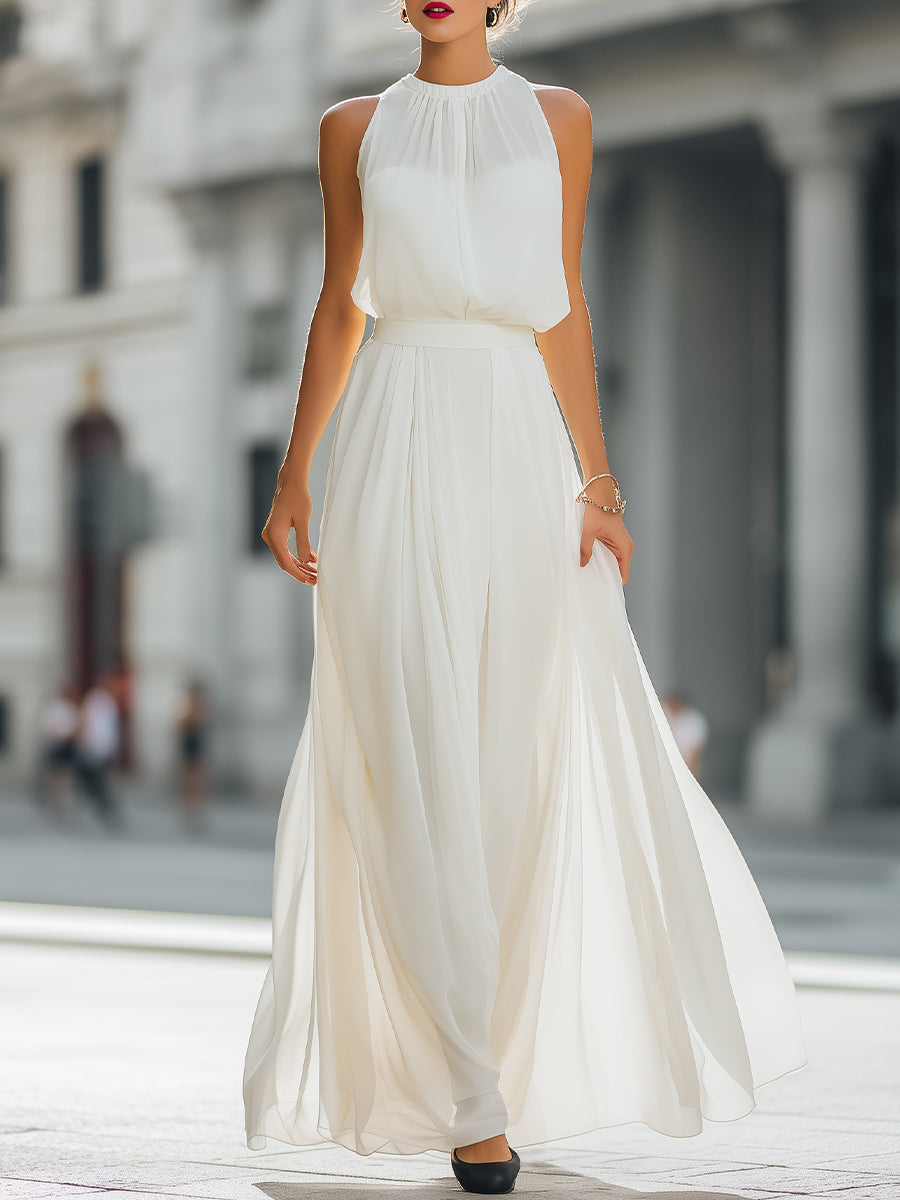 Pleated Halter Neck Maxi Dress with Flowing Skirt – KSXTXX Pleated Halter Neck Maxi Dress with Flowing Skirt – KSXTXX
