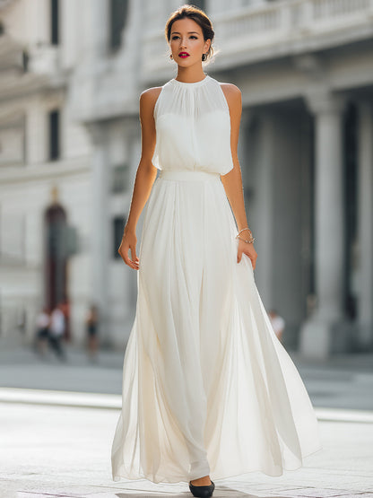 Pleated Halter Neck Maxi Dress with Flowing Skirt