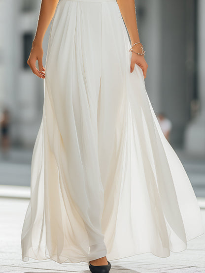 Pleated Halter Neck Maxi Dress with Flowing Skirt