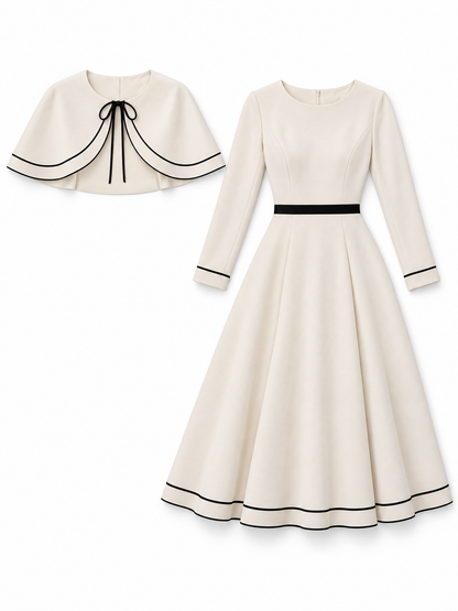Two-piece Set Featuring An Ivory-white Cape With Black Piping And An A-line Midi Skirt