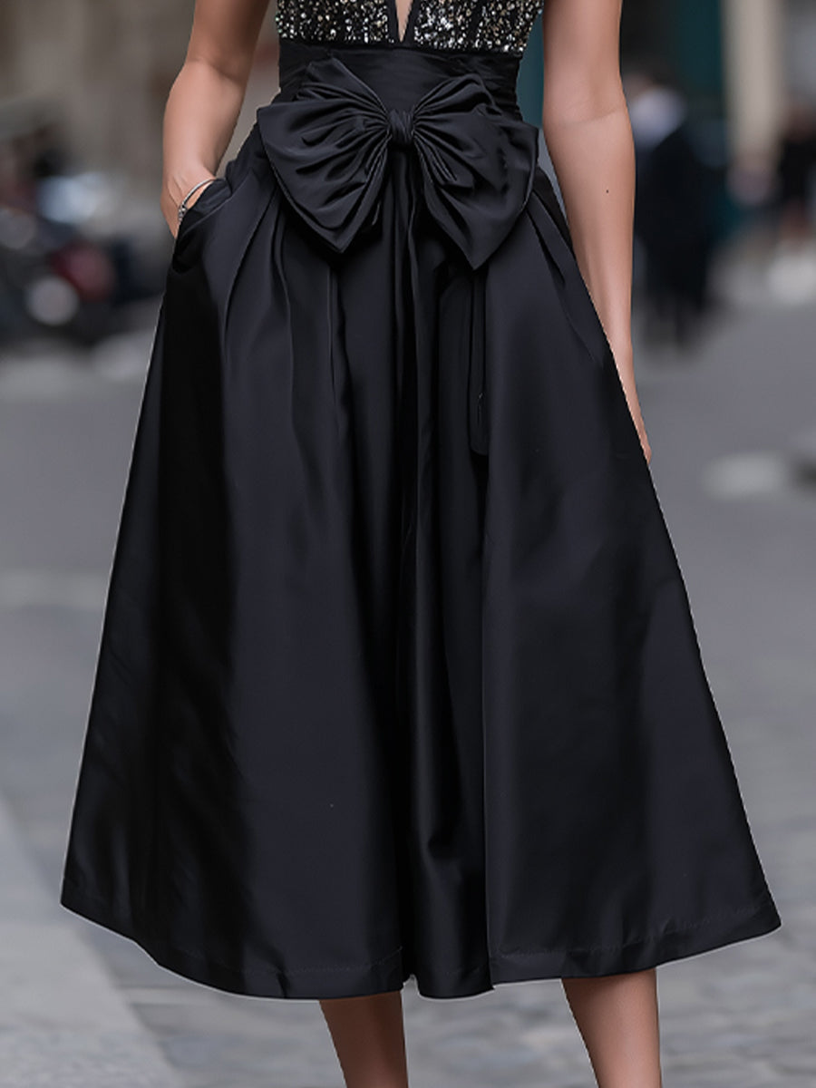 Midnight Sequin Radiance: V-Neck A-Line Midi Dress With Oversized Bow Detail