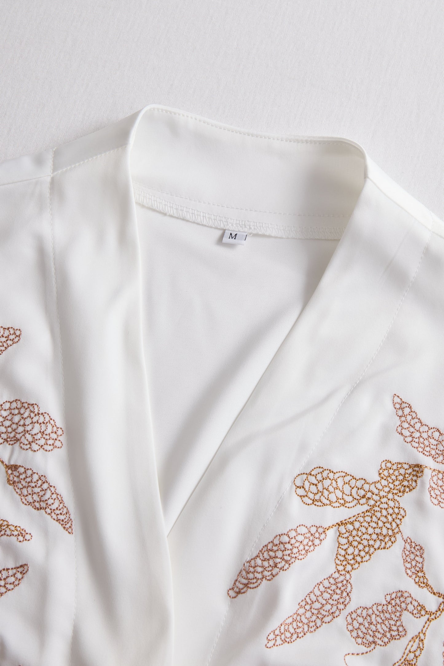 White Embroidered Blouse with Gold Floral Details