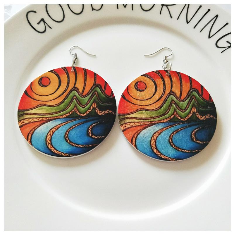 Geometric circular wooden earrings with patterns