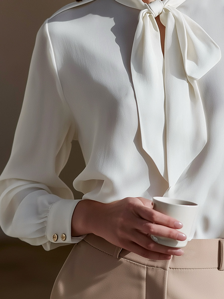 Elegant Tie-Neck Blouse With Gold-Button Shoulder Details