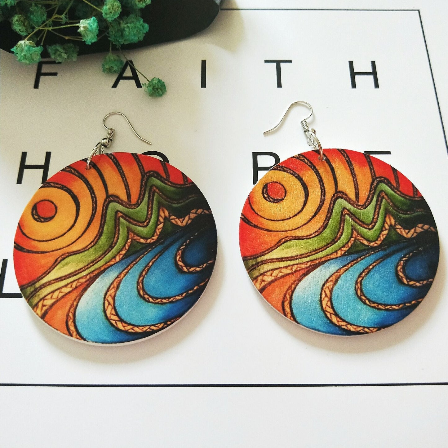 Geometric circular wooden earrings with patterns